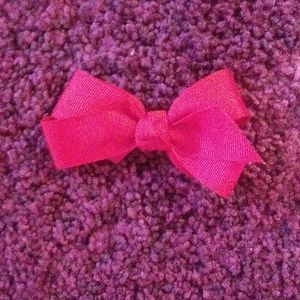 Red bow that is really pink